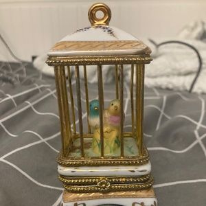 Bird cage small change or ring holder